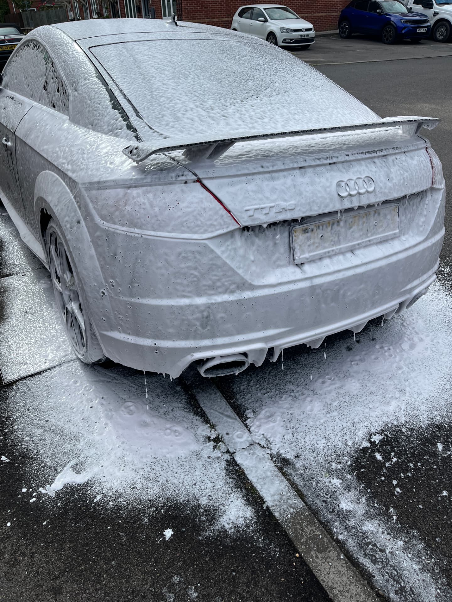 Audi TT RS covered in snow foam